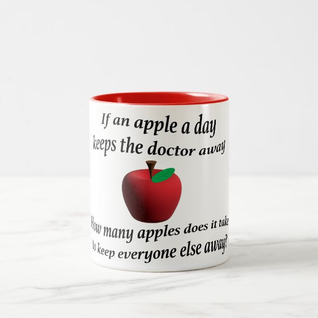 Apple a day keeps the doctor away  Two-Tone coffee mug (Center)