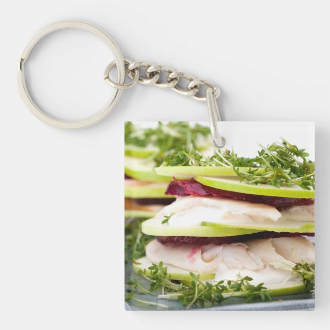 Apple and trout appetizer key ring (Front)