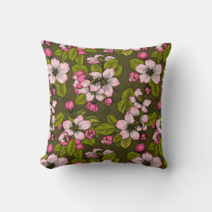 Apple blossom on dark green cushion