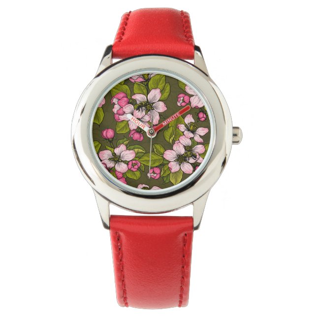 Apple blossom on dark green watch (Front)