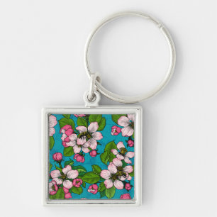 Apple blossom on turquoise key ring