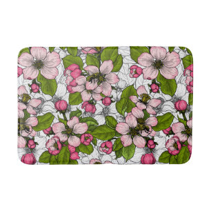 Apple blossom on white bath mat