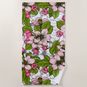 Apple blossom on white beach towel