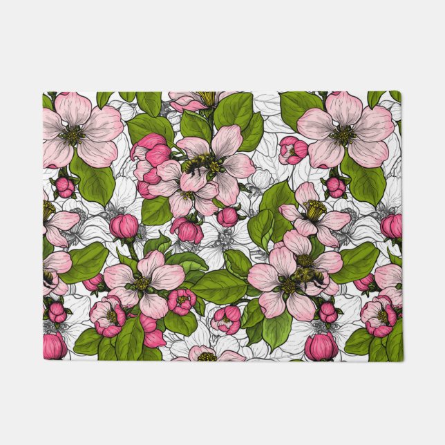 Apple blossom on white doormat (Front)