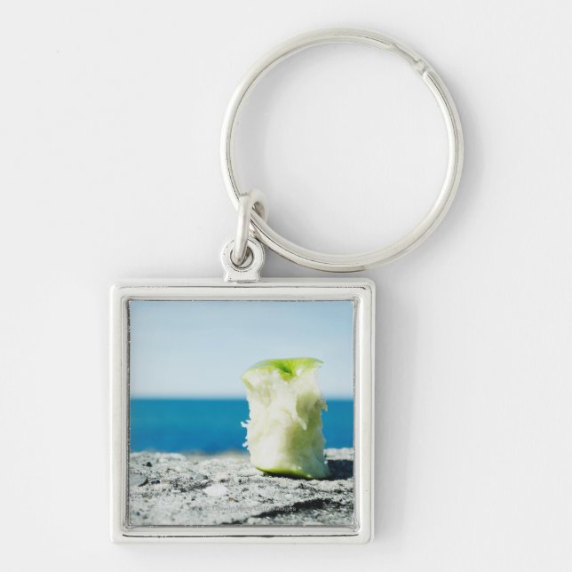Apple core in the dirt key ring (Front)