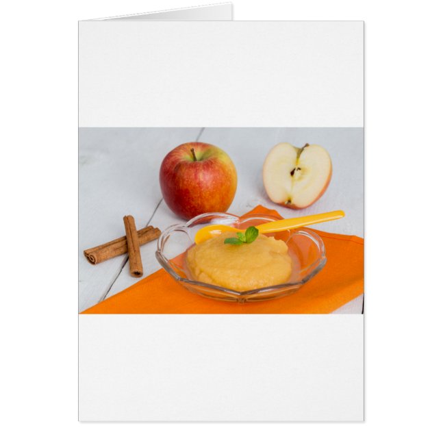 Applesauce with cinnamon and orange spoon (Front)
