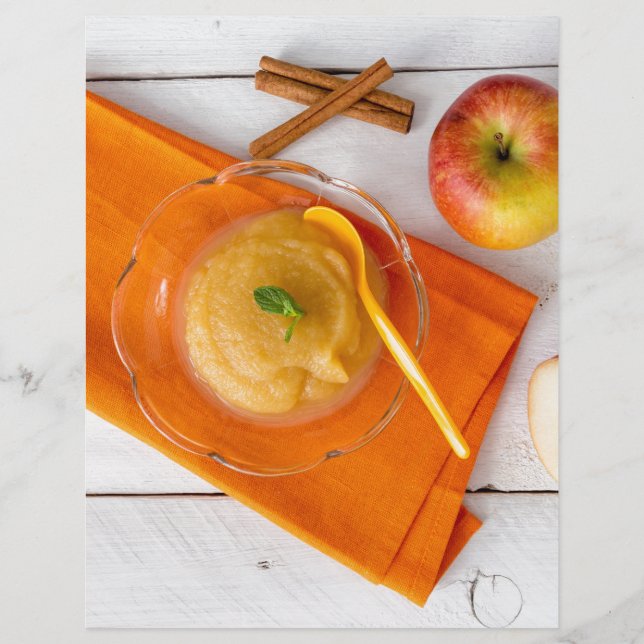 Applesauce with cinnamon and orange spoon (Front)