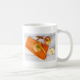Applesauce with cinnamon and orange spoon coffee mug