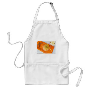 Applesauce with cinnamon and orange spoon standard apron