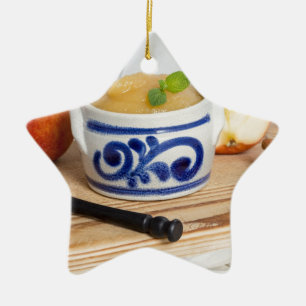 Applesauce with cinnamon in stoneware bowl ceramic tree decoration