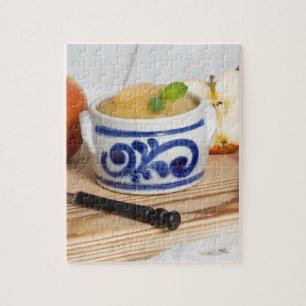 Applesauce with cinnamon in stoneware bowl jigsaw puzzle