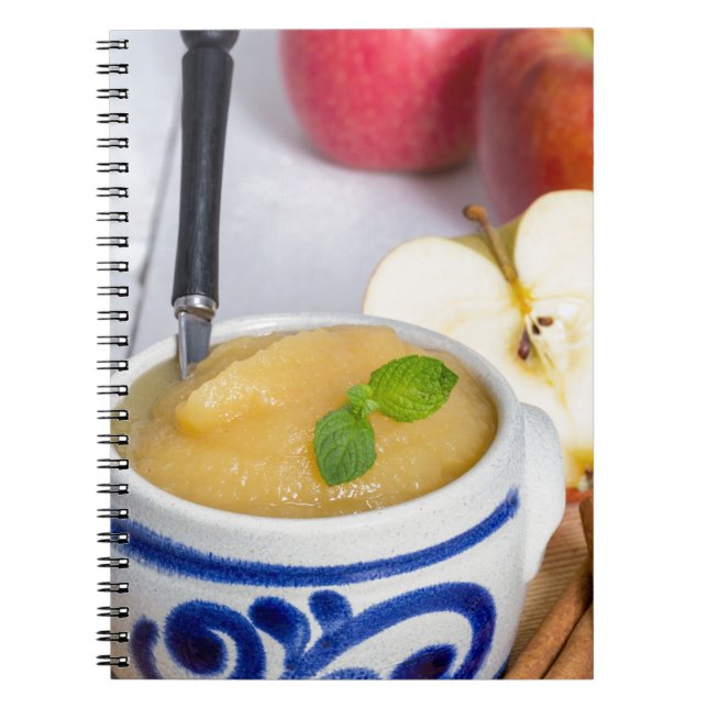 Applesauce with cinnamon in stoneware bowl notebook (Front)