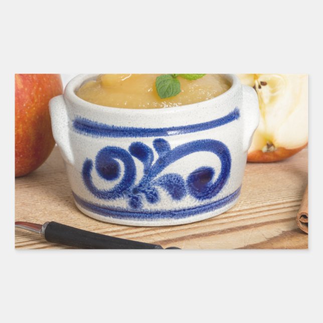 Applesauce with cinnamon in stoneware bowl rectangular sticker (Front)
