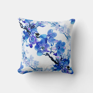 Apricot flowers in blue on a white background. cushion