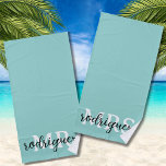 Aqua Beach Towel Custom Newlywed Bridal Gift<br><div class="desc">Introducing our customisable Solid Aqua Beach Towel, a perfect blend of style and sentimentality. Designed as a thoughtful gesture for newlyweds or as a cherished bridal shower gift, this towel exudes modern elegance and personalisation. Crafted in a serene aqua hue, it serves as a calming backdrop for the timeless "MRS"...</div>