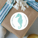 Aqua Blue Glitter Seahorse Coastal Christmas Classic Round Sticker<br><div class="desc">Add a coastal vibe to your holiday gifts and mail with these aqua blue glitter seahorse ocean-themed Christmas stickers. There is both Merry Christmas and Seas & Greetings. Please check out the collection for matching products. If you would like more matching products or other colorways, please contact me through Zazzle...</div>