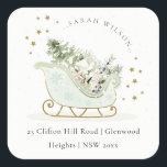 Aqua Blue Gold Winter Sleigh Christmas Address Square Sticker<br><div class="desc">Chill Out Sleigh Winter Theme Collection.- it's a cute pastel watercolor Illustration of Aqua blue gold sleigh filled with Christmas pine tree, gifts and winter berries with classy gold star frame and snowfall in the background. Perfect for your little ones winter birthday party. It’s very easy to customise, with your...</div>