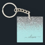 Aqua Blue Teal Silver Glitter Monogram Key Ring<br><div class="desc">Aqua Blue - Teal and Silver Faux Foil Sparkle Glitter Script Monogram Name Keychain. This makes the perfect sweet 16 birthday,  wedding,  bridal shower,  anniversary,  baby shower or bachelorette party gift for someone that loves glam luxury and chic styles.</div>