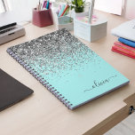 Aqua Blue Teal Silver Glitter Monogram Notebook<br><div class="desc">Aqua Blue - Teal and Silver Sparkle Glitter Script Monogram Name Spiral Notebook Planner. This makes the perfect sweet 16 birthday,  wedding,  bridal shower,  anniversary,  baby shower or bachelorette party gift for someone that loves glam luxury and chic styles.</div>