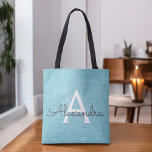 Aqua Teal Blue Sparkle Elegant Monogram Book Bag<br><div class="desc">Aqua Teal Ice Blue Faux Sparkle and Glitter Elegant Monogram Book Bag. This Book Bag can be customised to include your initial and first name.</div>