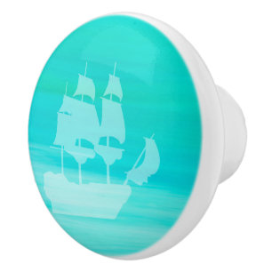 Aquamarine turquoise sea water with a sailing ship ceramic knob