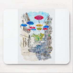 Aquarelle sketch art. Street with multicolored umb Mouse Mat