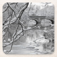 Arch Bridge over Frozen River in Winter