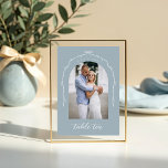 Arch Photo Blue Bow & Ribbon Wedding Table Number<br><div class="desc">Capture your love story in a modern and elegant way with our acrylic bow and ribbon wedding table number sign. Featuring a minimalistic design, with our hand drawn bow and ribbon arch design allows you to showcase your photo with grace and style. Elevate your wedding décor to new heights and...</div>