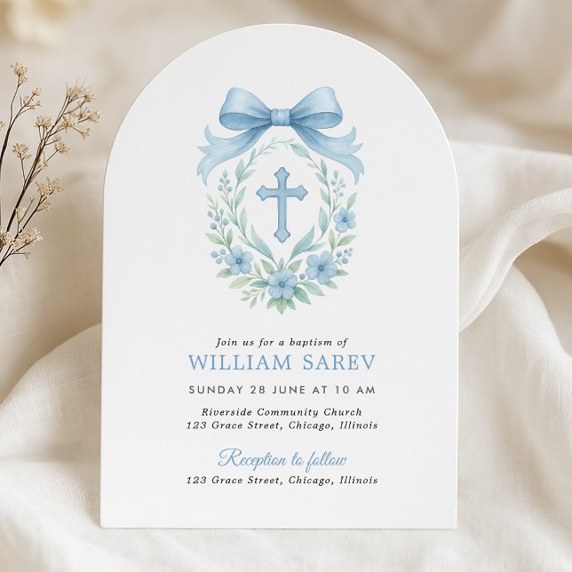 Arched Blue Baptism Invitation for Baby Boy (Elegant arched boy baptism invitation with blue bow and floral cross – neutral linen flat lay)