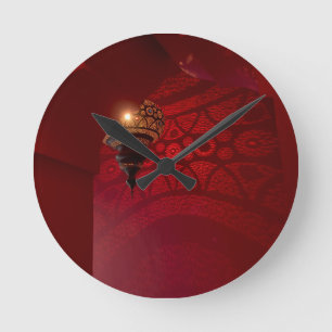 Arched entrance and illuminated lantern round clock