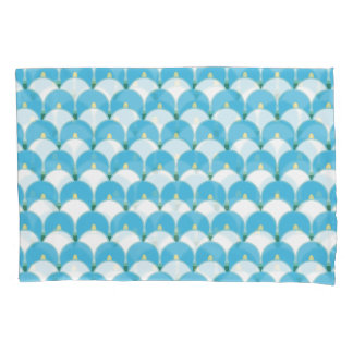 Arches, fan or lily flowers repeat pattern on blue pillowcase