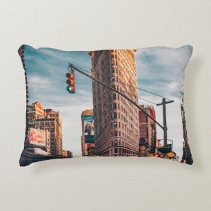 ARCHITECTURAL PHOTOGRAPHY OF BROWN BUILDING DECORATIVE CUSHION
