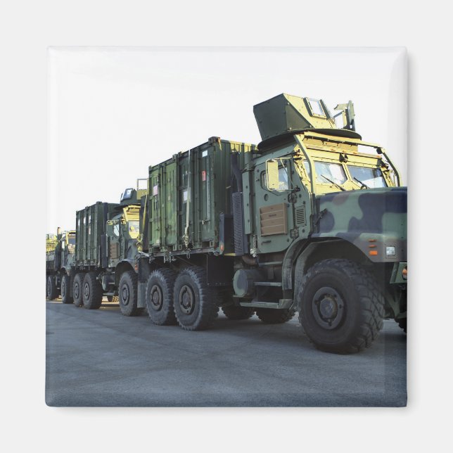 Armoured trucks sit on the pier at Morehead City Magnet (Front)