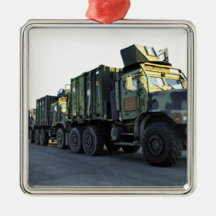 Armoured trucks sit on the pier at Morehead City Metal Tree Decoration