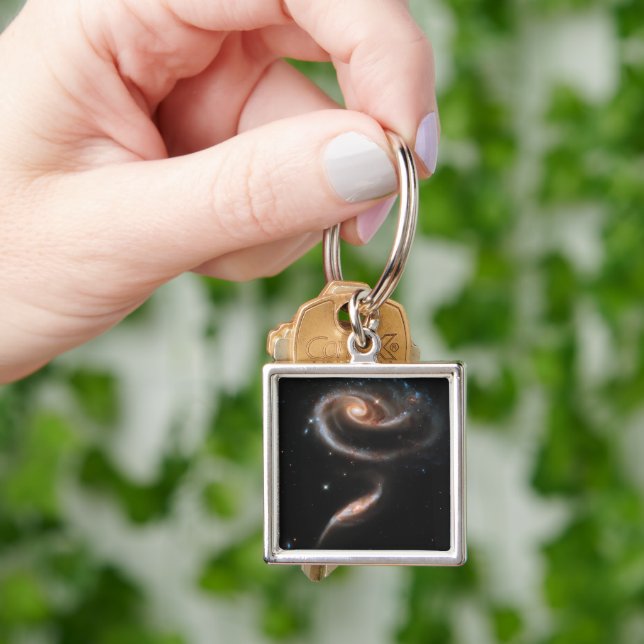 Arp 273 Interacting Galaxies In Andromeda. Key Ring (Hand)