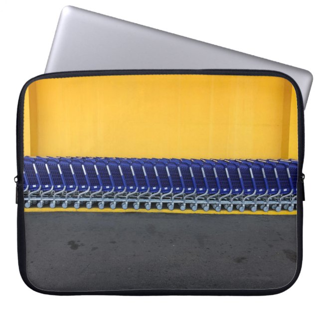 Arranged blue grocery carts laptop sleeve (Front)