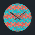 Art Deco Circles and Triangles  Round Clock<br><div class="desc">This clock has an art deco design of two-toned orange and teal circles inside two-toned orange and teal triangles.</div>