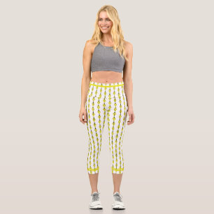 Art deco element in yellow capri leggings