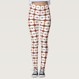 Art deco elements in deep orange leggings