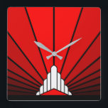 Art deco sun in red square wall clock<br><div class="desc">A classic art deco style sun pattern in red. 

An iconic pattern of the sun rising from behind a stylized art deco shaped building. A simple yet elegant design,  true to the era.</div>