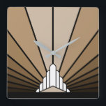Art deco sun in tan square wall clock<br><div class="desc">A classic art deco style sun pattern in tan. 

An iconic pattern of the sun rising from behind a stylized art deco shaped building. A simple yet elegant design,  true to the era.</div>