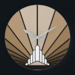 Art deco sun in tan Wall Clock<br><div class="desc">A classic art deco style sun pattern in tan. 

An iconic pattern of the sun rising from behind a stylized art deco shaped building. A simple yet elegant design,  true to the era.</div>