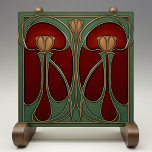 Art Nouveau Tulip Tapestry Ceramic Tile<br><div class="desc">This ceramic tile exudes the warmth and splendour of the Art Nouveau period, capturing the essence of its iconic style. Twin tulips in rich shades of amber and gold rise against a striking backdrop of crimson and maroon, their slender stems and curvaceous leaves outlined in elegant aged bronze. The luscious...</div>