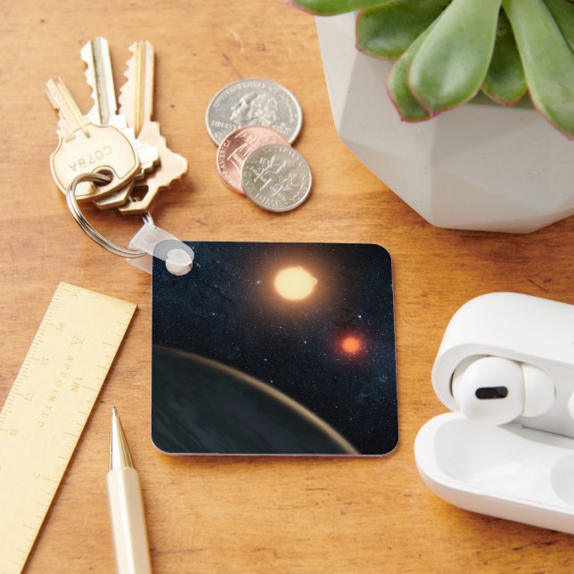 Artist's Concept Illustrating Kepler-16b. Key Ring (Desk)