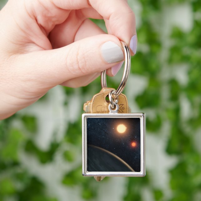 Artist's Concept Illustrating Kepler-16b. Key Ring (Hand)