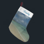 Aruban Beach II Beautiful Nature Scene Small Christmas Stocking<br><div class="desc">Sometimes you just want to get away to somewhere warm and tropical, and this picture sums up the experience. This tropical scene shows the white sand beach of Aruba with a coconut palm tree. Check out our store for more calming beach photos. This picture is also featured as the widescreen...</div>