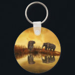 Asian Elephants in Thailand under a glowing sunset Key Ring<br><div class="desc">Beautiful photo of a group of asian elephants taken in Thailand under the setting sun. The lighting in this photo creates a vintage retro mood.</div>