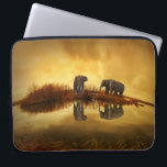 Asian Elephants in Thailand under a glowing sunset Laptop Sleeve<br><div class="desc">Beautiful photo of a group of asian elephants taken in Thailand under the setting sun. The lighting in this photo creates a vintage retro mood.</div>