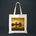 Asian Elephants in Thailand under a glowing sunset Tote Bag<br><div class="desc">Beautiful photo of a group of asian elephants taken in Thailand under the setting sun. The lighting in this photo creates a vintage retro mood.</div>