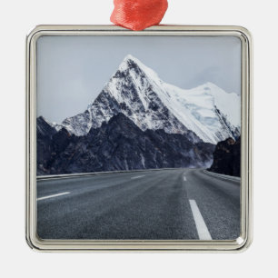 Asphalt Road in front of Snow Mountain Metal Tree Decoration